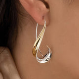 Golden dangling vintage earrings