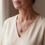 Elegant necklace with purple crystal